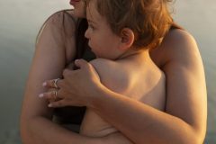 mom-spending-time-with-kid-beach-scaled