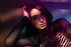 portrait-person-attending-vibrant-techno-music-party-scaled